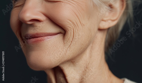Detailed view of a senior woman's face highlighting natural aging signs. Concept of skin positivity, honesty, and raw human beauty.