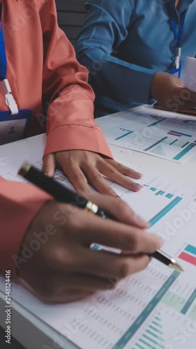 Asian business adviser meeting to analyze and discuss the situation on the financial report in the meeting room.Investment Consultant, Financial advisor and accounting concept