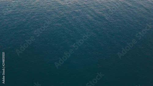 Calming deep blue ocean water surface