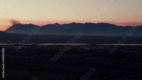 Mountain range silhouette during a peaceful sunset