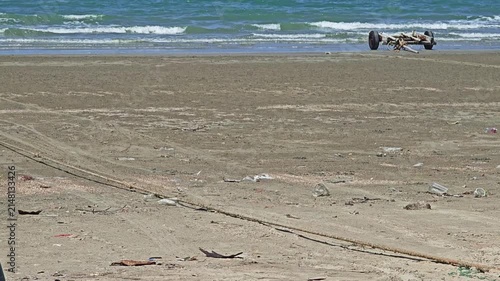 Boat towing rope on the beach.