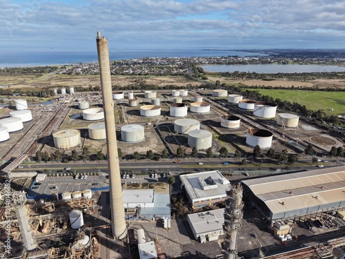 Картината върху платно Altona oil refinery with storage tanks and smokestack
