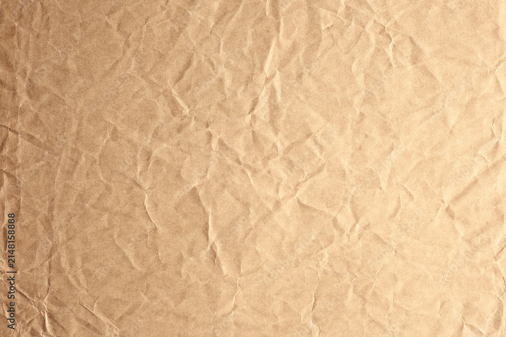 Fototapeta premium Brown kraft crumpled paper texture