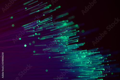 Glowing fiber optic strands for digital data transmission