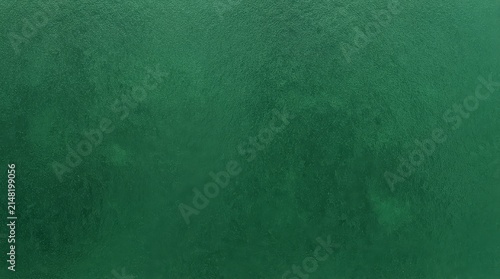 Deep green textured abstract background with subtle gradient