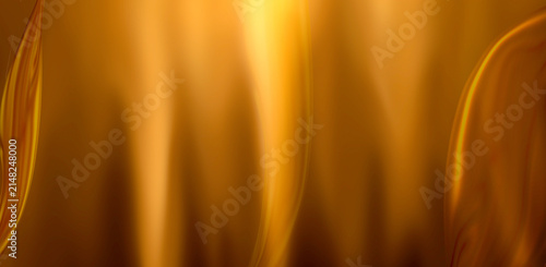 Принти на полотні Golden yellow liquid light abstract background with vertical flowing waves and soft silk fabric texture
