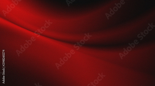 Red fabric texture with a pleated or wavy effect. With a gradation of dark red to bright red. which gives the impression of a material such as satin, velvet, or a smooth digital background.
