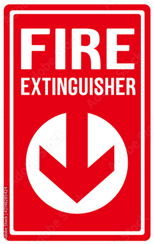 A red sign with an arrow indicating the location of the fire extinguisher.