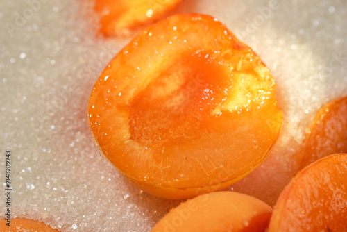 Cooking berries apricot with sugar. Apricots jam making process. Shallow depth of field.