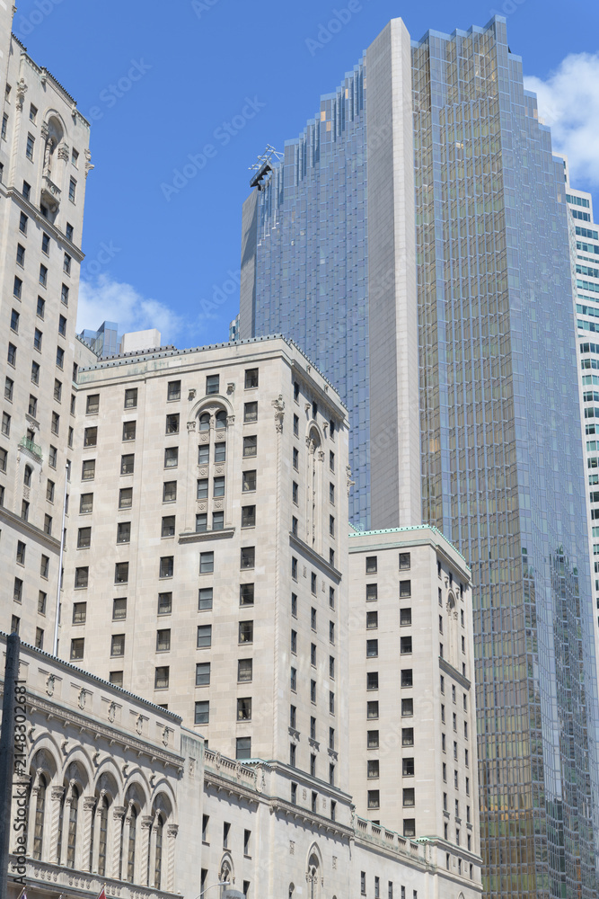 Fototapeta premium view of the Fairmont Royal York hotel (central block with projecting wings) and Royal Bank Plaza South Tower on Front St W, Toronto