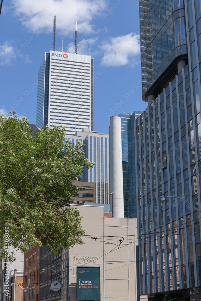 Fototapeta premium view of First Canadian Place, headquarters of BMO Financial Group, from Pearl St and Simcoe St, near the Financial District, Toronto
