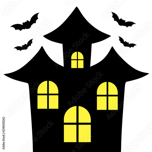 Spooky black house glows with yellow windows. halloween house and bats