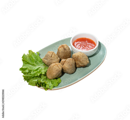 Photography Fried meatballs on a plate with lettuce and chili dipping sauce isolated on tran
