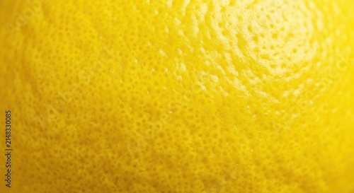 Close-up Texture of a Bright Yellow Lemon Peel