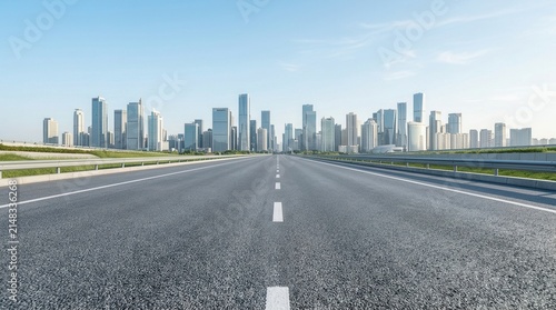 Modern city skyline viewed from an empty asphalt road