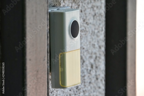 close up of a doorbell. One button doorbell. Basic doorbell.