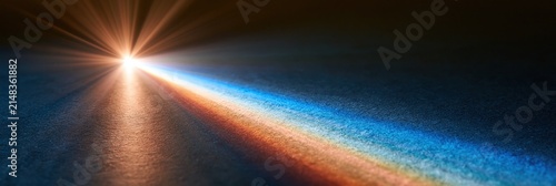 Light Spectrum Refraction Through Prism Creating Rainbow Effect on Dark Surface