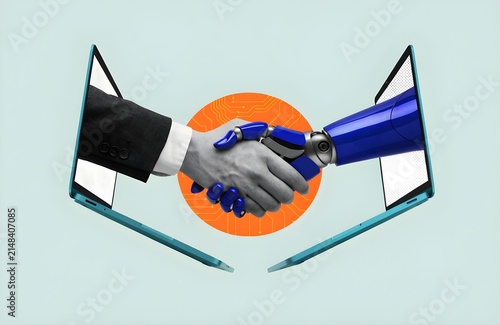 Human hand and robot arm shaking hands through laptop screens