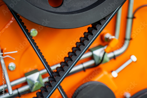 Konstfotografi Heavy duty cogged drive belt and pulley wheel system on commercial machinery dem