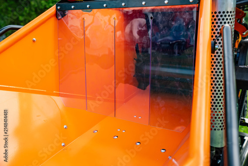 Konstfotografi Transparent plastic safety deflector flaps in wood chipper feed hopper illustrat