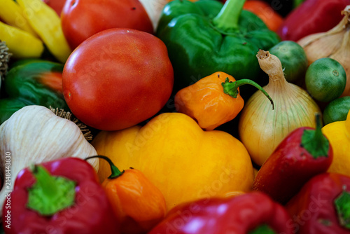 Fresh vegetables in vibrant colors displayed at a local market during daytime