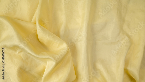 Canvastavla asymmetric folds of light yellow silk fabric full width