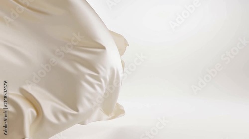 White silk fabric ripples and folds