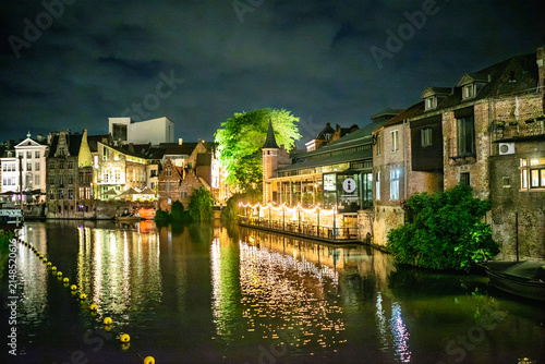 Illuminated Historic Buildings and Canalside View at Night in Ghent, Belgium