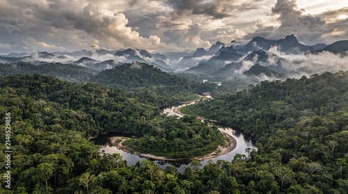 Foto Winding river flows through lush tropical rainforest under dramatic stormy mount