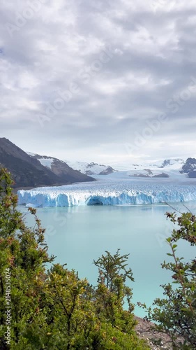 Panoramic view of Perito Moreno Glacier with turquoise lake water in Los Glaciares National Park, Patagonia, Argentina