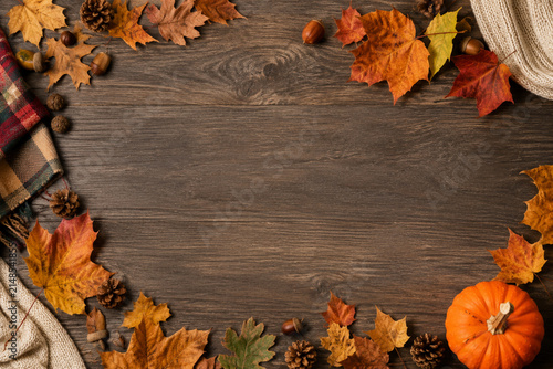 Old wooden background with autumn concept, space for text
