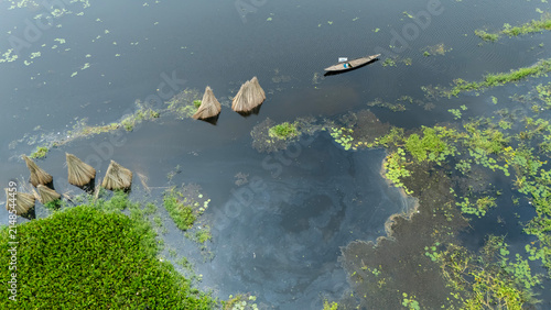 Konstfotografi Flooded monsoon waters cover Bortir Bil, North 24 Parganas, West Bengal, India