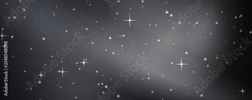 Фотография Monochrome grey starry night sky background, with glowing light, particles and s