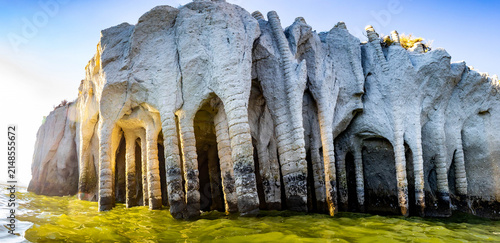 Obraz na plátně Crowley Lake Stone Columns rising from green water in Mono County California