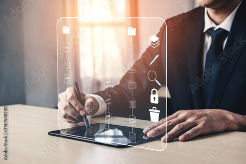 Konstfotografi Business Professional Using Digital Tablet for Document Management and Workflow Optimization with Icons Representing Data Processing