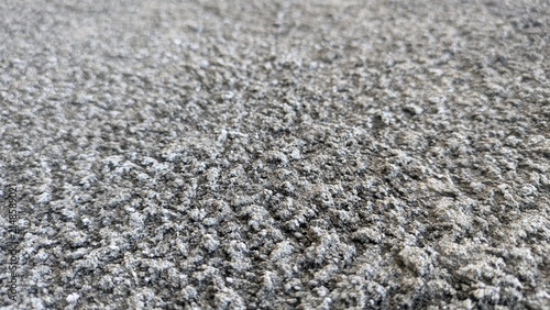 Obraz na płótnie rough textured concrete surface close up grey aggregate pavement industrial cons