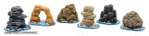 Six detailed miniature rock island models for tabletop gaming, featuring a sandstone arch, mossy crag, and pebble mound on simulated water bases with small waves