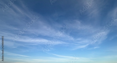 Картината върху платно Blue sky with sweeping wispy clouds and soft natural background