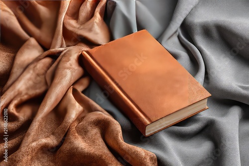 Minimalist book mockup on soft suede background