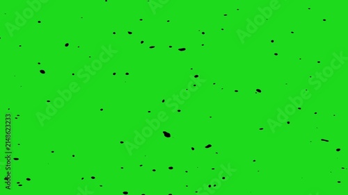 Dots splash motion on green screen.