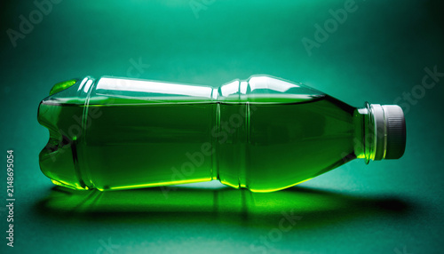 Green Glass Bottle Lying on Its Side.