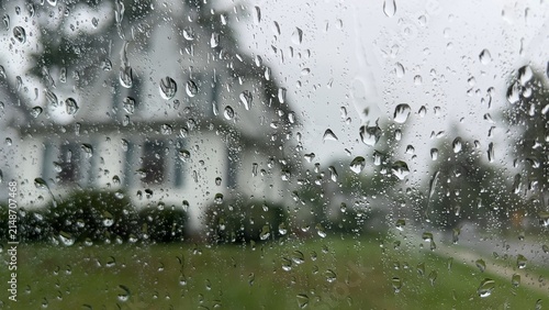 Raindrops on a car window.