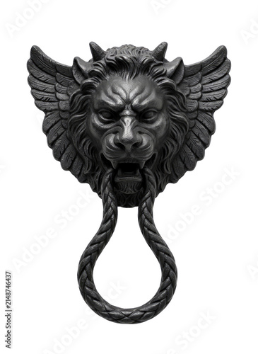 Antique winged lion door knocker with twisted ring in dark metal, isolated on a transparent background
