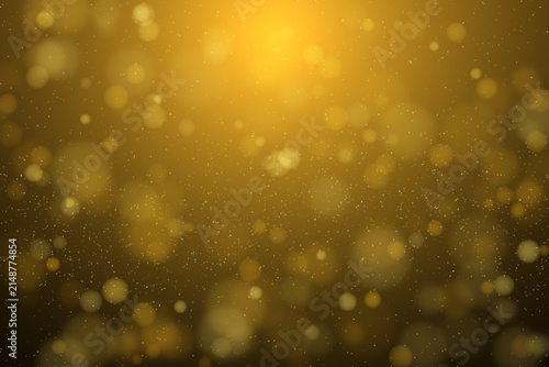 Luminous golden background with soft bokeh and fine floating particles, creating a celebratory atmosphere.