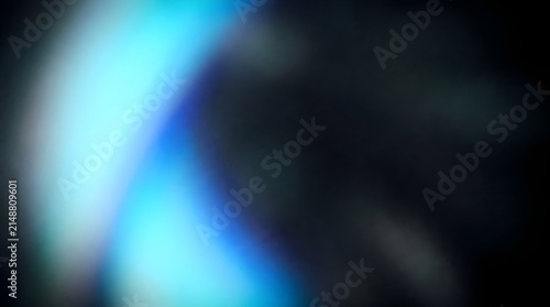 Abstract blue light streak glowing across dark black textured background