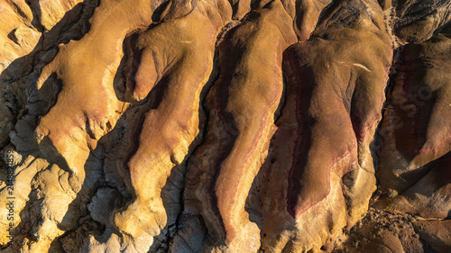 Fotografie The spectacular multicolored badlands of Anjihai Grand Canyon in Xinjiang, China