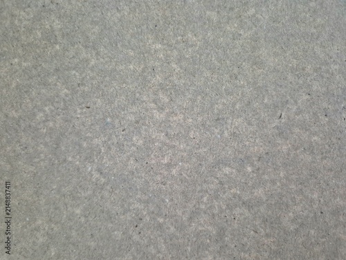 Close up of grey recycled cardboard fiberboard texture background