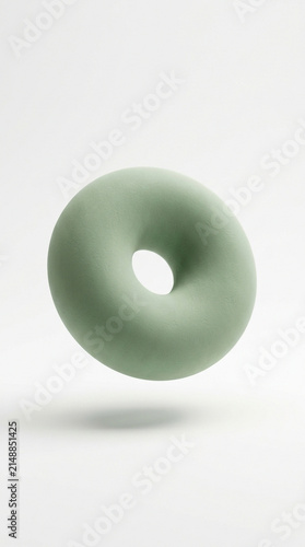 Presented on white this abstract torus features a soft rounded silhouette and subtle shadow