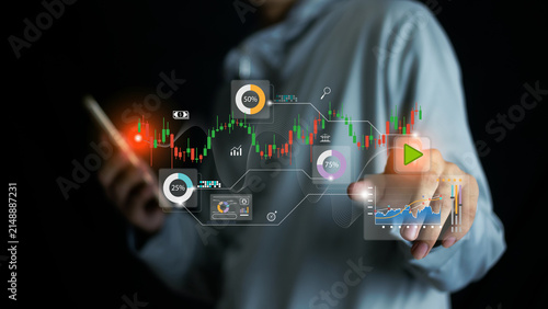 Business professional analyzing AI-powered financial dashboards with real-time market data, investment insights, and interactive analytics for smarter trading and business decisions.