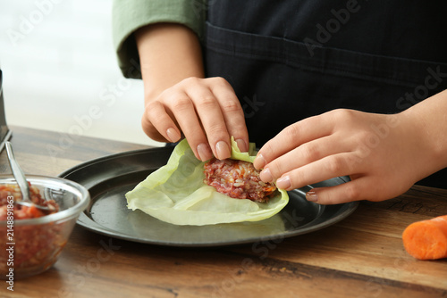 Woman preparing stuffed cab...